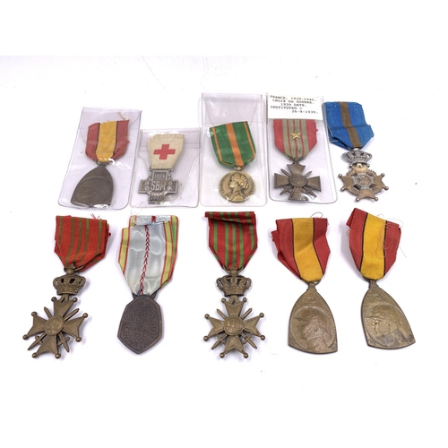 2221 - Ten medals, six Belgian and four French to include Croix de Guerre etc.