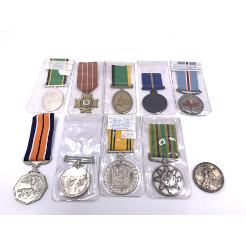 2223 - Ten South African medals to include Police Star For Faithful Service, Pro Merito, Cross of Rhodesia ... 