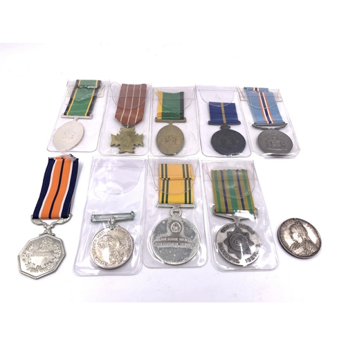 2223 - Ten South African medals to include Police Star For Faithful Service, Pro Merito, Cross of Rhodesia ... 