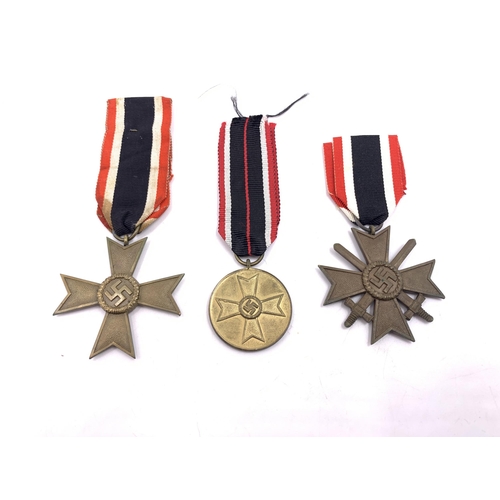 2228 - Three WWII German medals, one War Merit, one War Merit Cross and one War Merit Cross 2nd Class