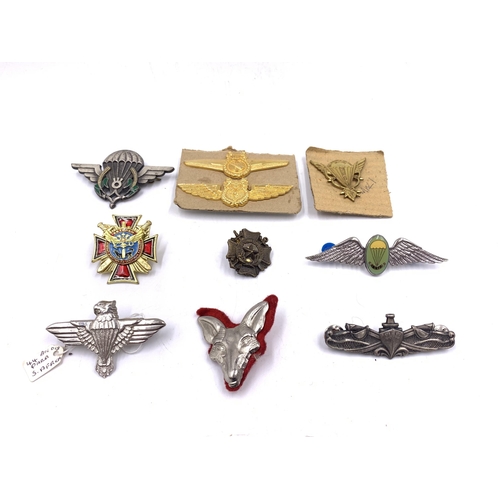 2230 - Ten military badges to include 44 Parachute Brigade, Spetsnaz, Border Regiment etc.