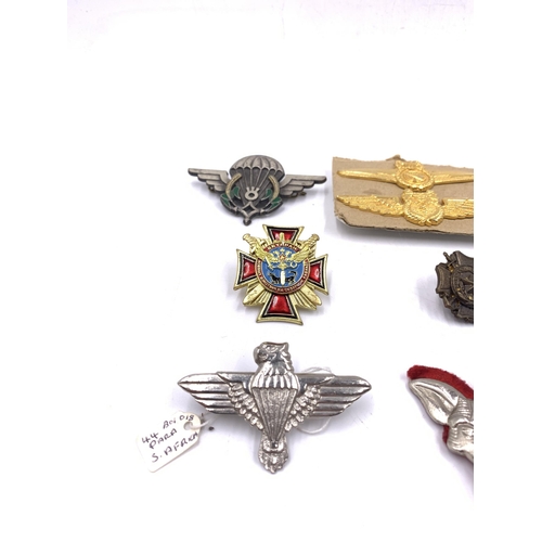 2230 - Ten military badges to include 44 Parachute Brigade, Spetsnaz, Border Regiment etc.