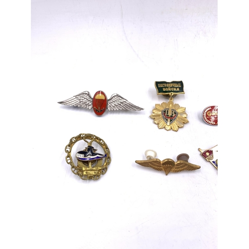 2231 - Ten military badges to include Soviet Naval, Atomic Sub Fleet, South Africa Parachute Wing etc.