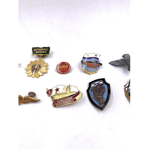 2231 - Ten military badges to include Soviet Naval, Atomic Sub Fleet, South Africa Parachute Wing etc.