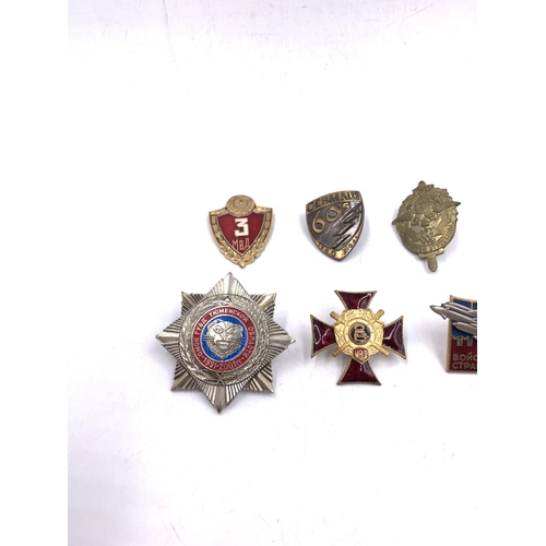 2232 - Ten military badges to include Russian 200 Years Ministry of Internal Affairs, Soviet Union Navy Sub... 