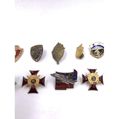 2232 - Ten military badges to include Russian 200 Years Ministry of Internal Affairs, Soviet Union Navy Sub... 