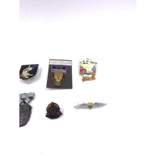 2234 - Ten military badges to include Angolan 16th Brigade, Russian Navy Submarine Force, South African Par... 