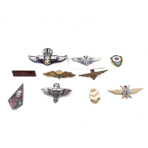 2235 - Ten military badges to include Senior Navigators USAF, Thai Free Faller Parachutist, Bombardier Seco... 