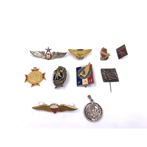 2236 - Ten military badges to include French Rapid Action Force, South African Parachutist badge, Thailand ... 