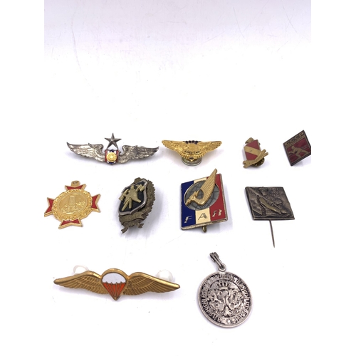 2236 - Ten military badges to include French Rapid Action Force, South African Parachutist badge, Thailand ... 