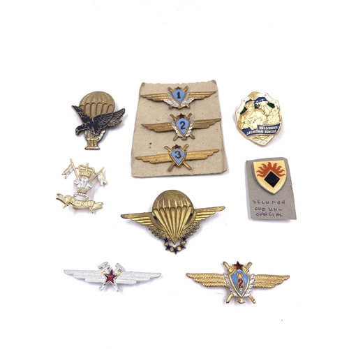 2237 - Ten military badges to include British Army cap, French Airborne Para, South African Secunda Command... 