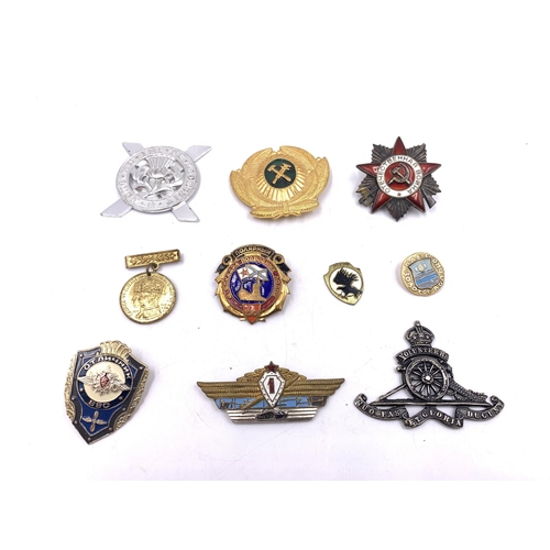 2238 - Ten military badges to include Soviet Union Order of The Patriotic War, Lowland Brigade Officers cap... 