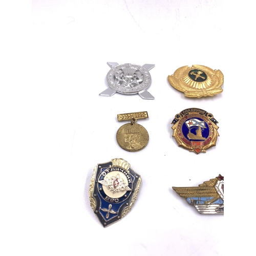 2238 - Ten military badges to include Soviet Union Order of The Patriotic War, Lowland Brigade Officers cap... 