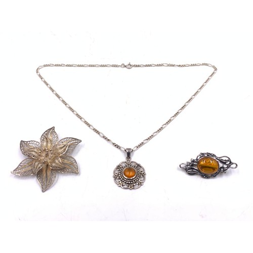 2095A - Three pieces of .925 silver jewellery, one amber pendant necklace, one amber brooch and one filigree... 