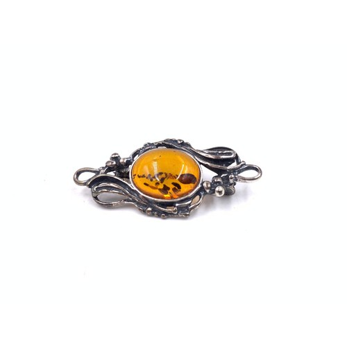 2095A - Three pieces of .925 silver jewellery, one amber pendant necklace, one amber brooch and one filigree... 