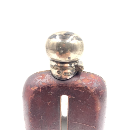 2096 - An Edwardian glass and leather hip flask with William Hutton & Sons Ltd hallmarked Birmingham silver... 