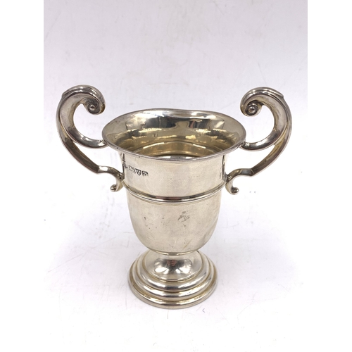 2100 - A hallmarked Chester silver miniature trophy, dated 1926 - approx. gross weight 72g