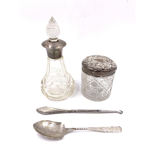 2102 - Four hallmarked sterling silver items, one silver handled steel button hook, one glass jar with silv... 