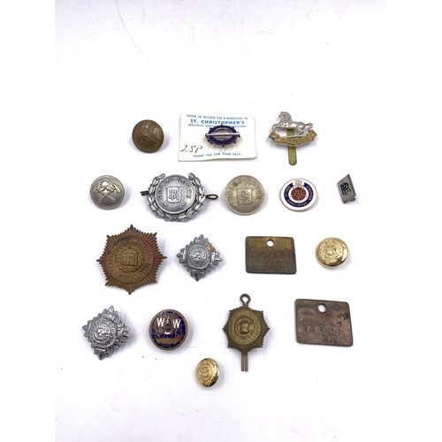 2244 - A collection of badges and plaques to include two Rolls Royce Crewe Division brass plaques, two Roll... 