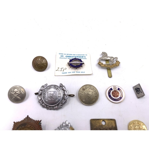 2244 - A collection of badges and plaques to include two Rolls Royce Crewe Division brass plaques, two Roll... 