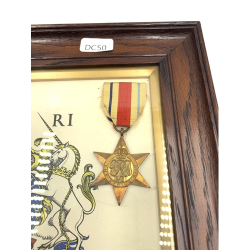 2245 - An oak framed WWII four piece medal group with scroll presented to Corporal H. Bould Royal Army Ordn... 