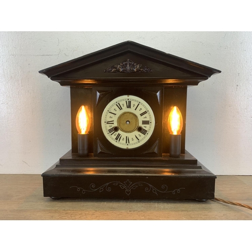 19 - A 19th century black painted wooden mantel clock/converted lamp - approx. 35cm high  x39cm wide