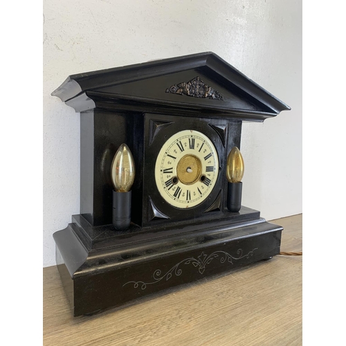 19 - A 19th century black painted wooden mantel clock/converted lamp - approx. 35cm high  x39cm wide