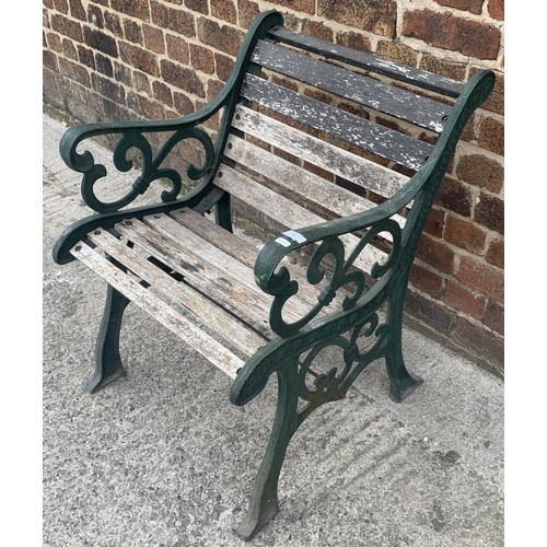 121 - A cast iron and wooden slatted garden armchair - approx. 78cm high x 62cm wide x 60cm deep