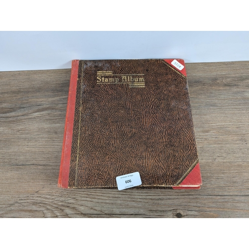 509 - A mid 20th century stamp album containing a collection of Worldwide stamps