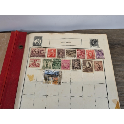 509 - A mid 20th century stamp album containing a collection of Worldwide stamps