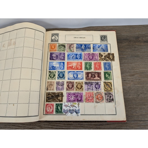 509 - A mid 20th century stamp album containing a collection of Worldwide stamps