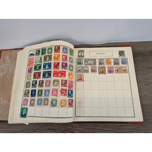 509 - A mid 20th century stamp album containing a collection of Worldwide stamps