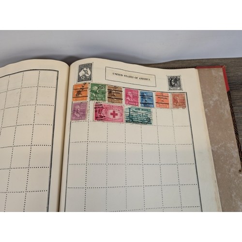 509 - A mid 20th century stamp album containing a collection of Worldwide stamps