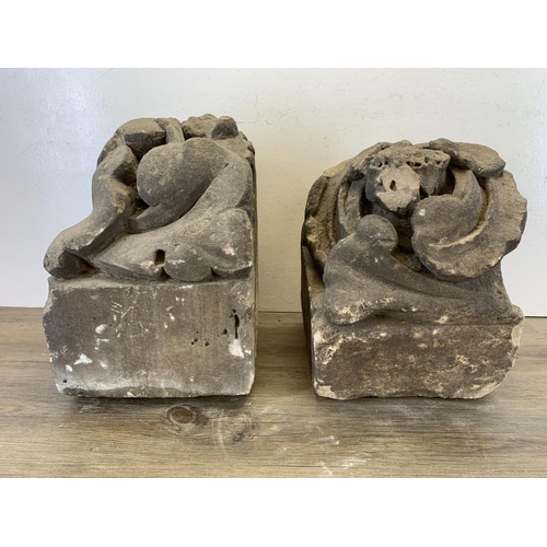 517 - Two medieval carved stone gargoyle corbels - largest approx. 40cm high x 25cm wide