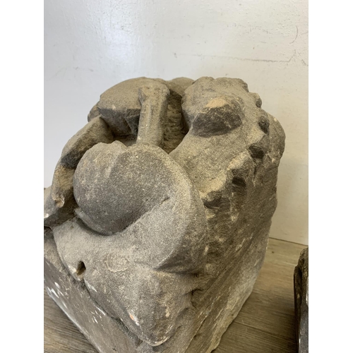 517 - Two medieval carved stone gargoyle corbels - largest approx. 40cm high x 25cm wide