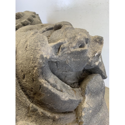 517 - Two medieval carved stone gargoyle corbels - largest approx. 40cm high x 25cm wide