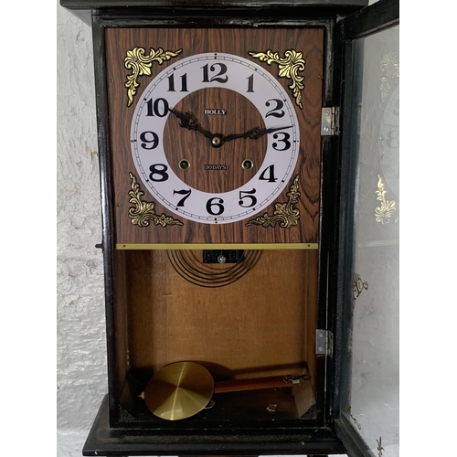 262 - A late 20th century Holly 30 day chiming wall clock