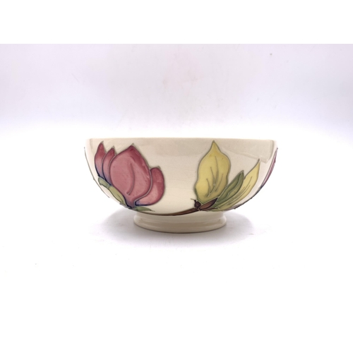 363 - A Moorcroft Pottery Magnolia pattern circular footed bowl - approx. 7cm high x 16cm diameter