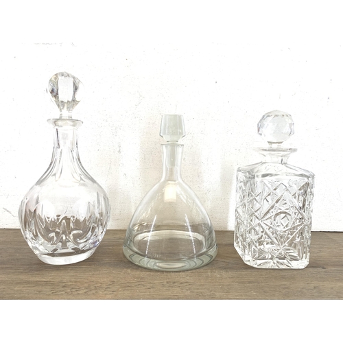 370 - Five pieces of glassware, three decanters and a pair of Royal Doulton candlesticks - approx. 10.5cm ... 