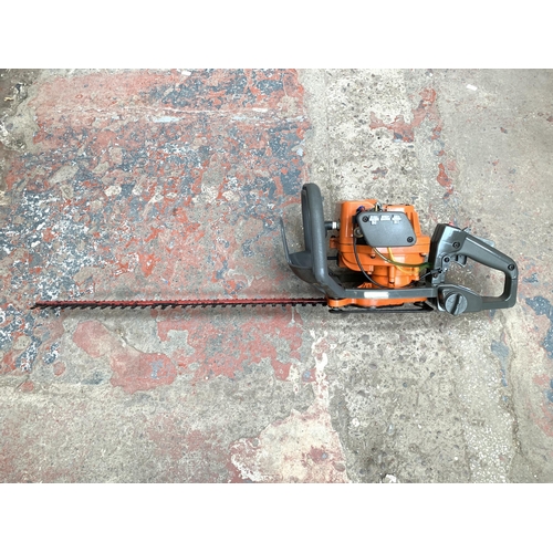 1046 - A Husqvarna 18H petrol hedge trimmer