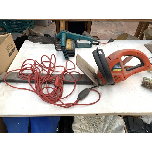 1060 - Two electric garden tools, one Husqvarna 600H hedge trimmer and one Black & Decker DN301 chainsaw