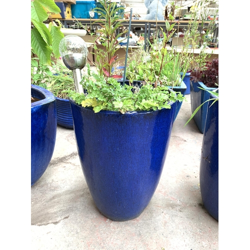 1069 - A pair of blue glazed garden planters - approx. 43cm high x 30cm diameter