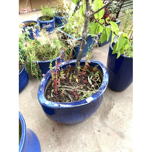 1070 - A blue glazed oval garden planter - approx. 38cm high x 50cm wide