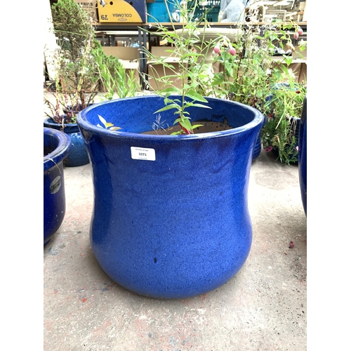 1071 - Two blue glazed garden planters - largest approx. 35cm high x 37cm diameter