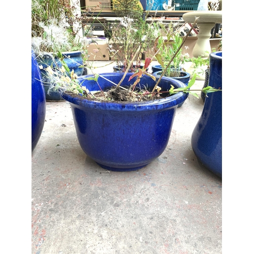 1071 - Two blue glazed garden planters - largest approx. 35cm high x 37cm diameter