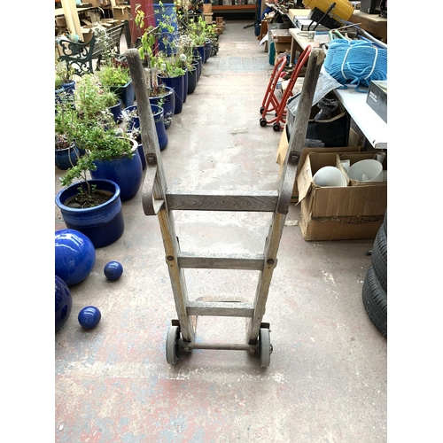 1075 - A vintage wood and metal sack truck - approx. 122cm high