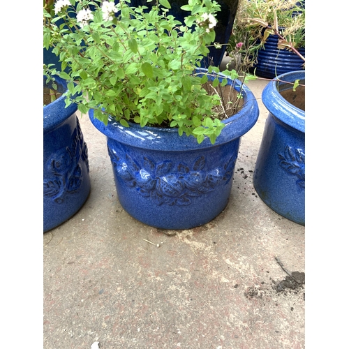 1083 - Three matching blue glazed garden planters - approx. 22cm high x 21cm diameter