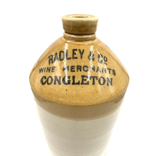 375 - An early 20th century Radley & Co. Wine Merchants of Congleton stoneware flagon - approx. 34cm high