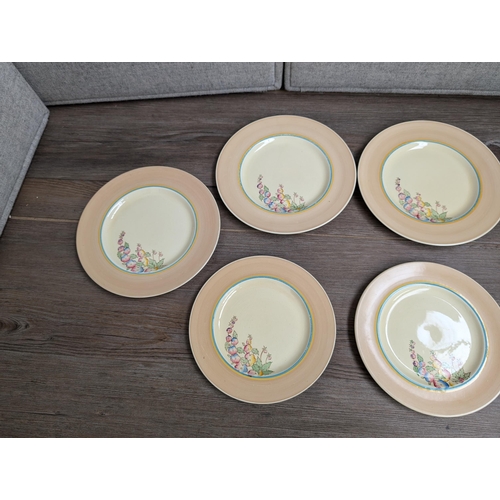 354 - Ten Clarice Cliff for Newport Pottery Co. England Hollyhocks pattern plates, six 23cm and four 20cm