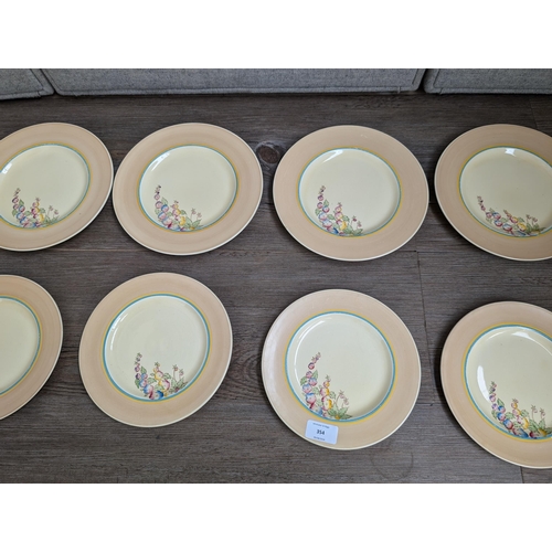 354 - Ten Clarice Cliff for Newport Pottery Co. England Hollyhocks pattern plates, six 23cm and four 20cm